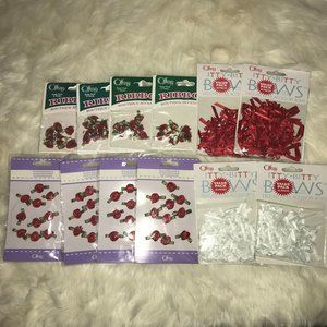 Lot of red ribbon roses and red and white ribbon bows New